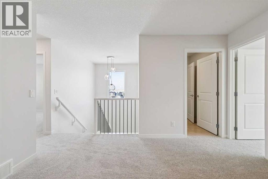 28 Calhoun Rise Ne, Calgary, AB - Indoor Photo Showing Other Room