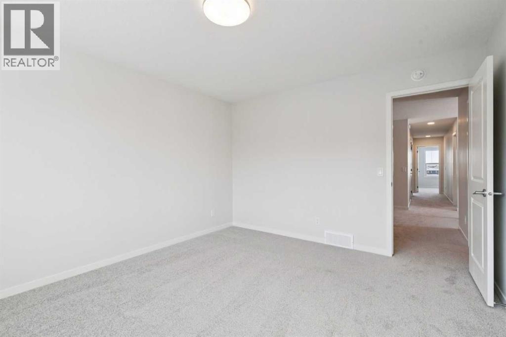 28 Calhoun Rise Ne, Calgary, AB - Indoor Photo Showing Other Room