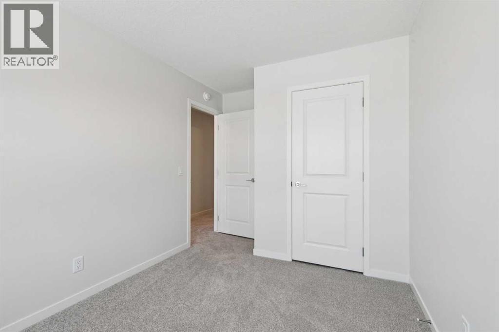 28 Calhoun Rise Ne, Calgary, AB - Indoor Photo Showing Other Room