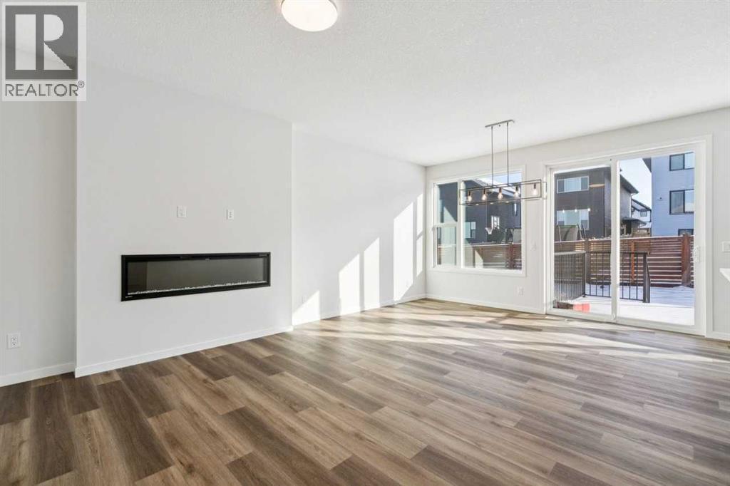 28 Calhoun Rise Ne, Calgary, AB - Indoor Photo Showing Living Room With Fireplace