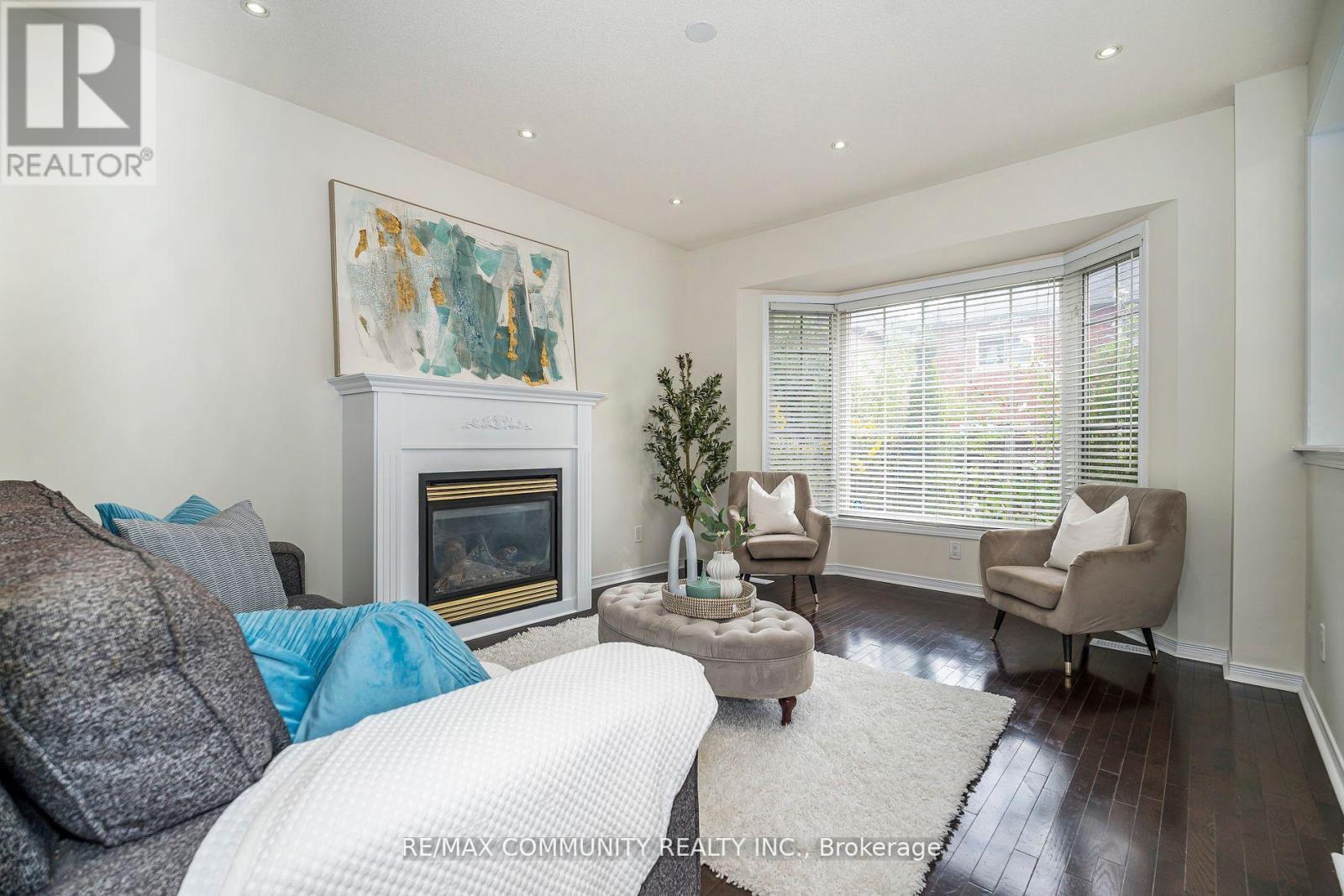 7 Cragg Crescent, Ajax, ON - Indoor Photo Showing Living Room With Fireplace