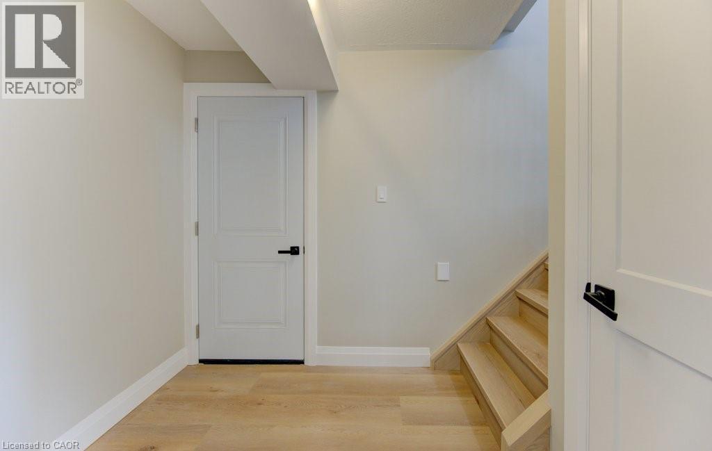 access to garage - 402 Heritage Drive, Kitchener, ON - Indoor Photo Showing Other Room