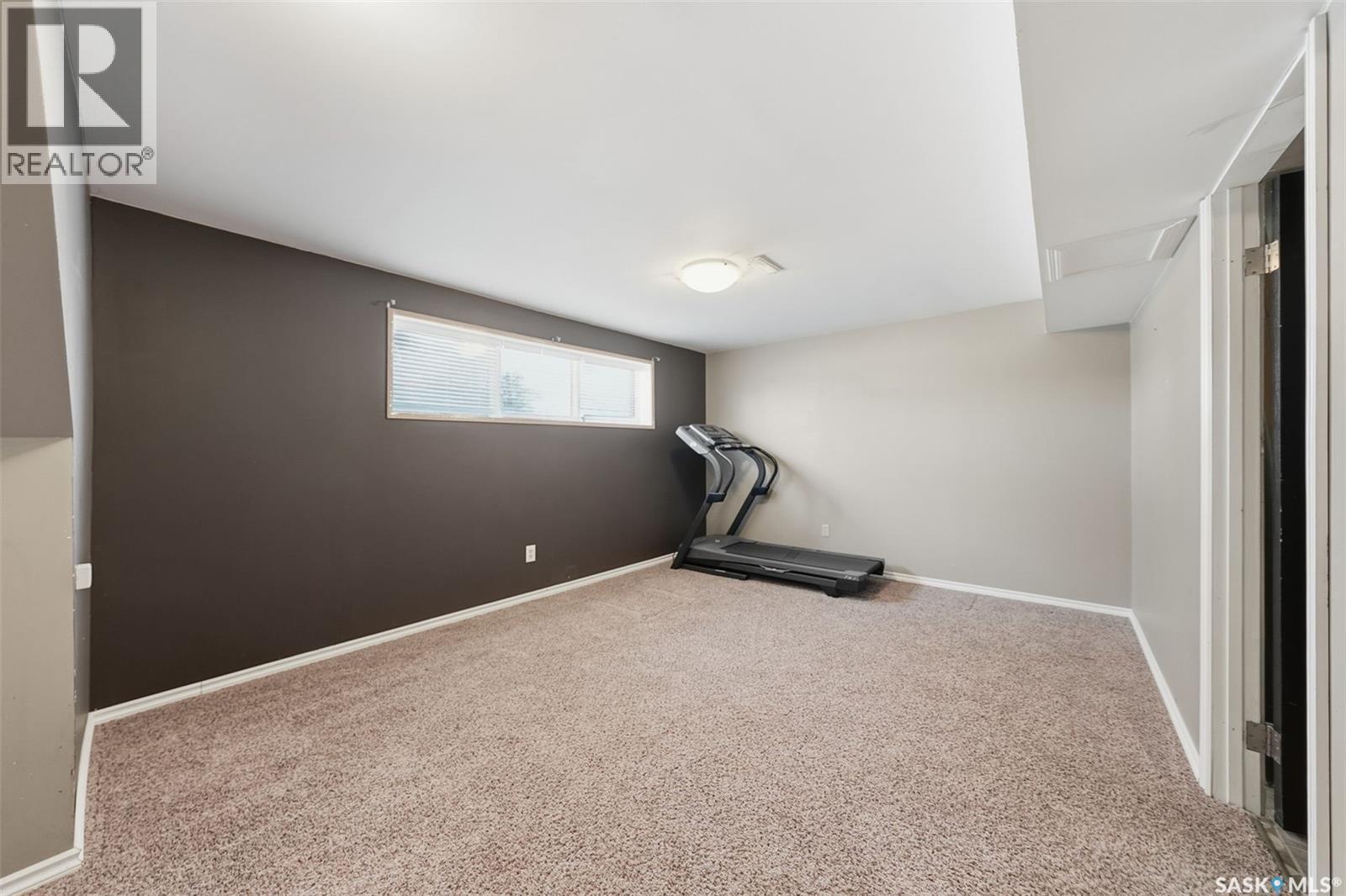 3441 12Th Avenue E, Prince Albert, SK - Indoor Photo Showing Gym Room