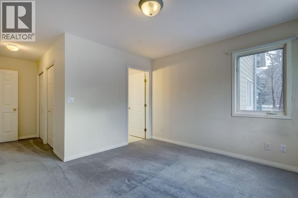 4, 704 8Th Avenue, Canmore, AB - Indoor Photo Showing Other Room