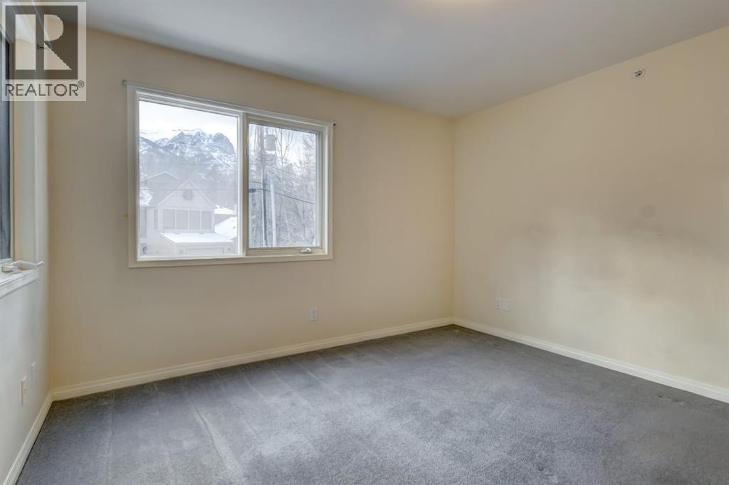 4, 704 8Th Avenue, Canmore, AB - Indoor Photo Showing Other Room