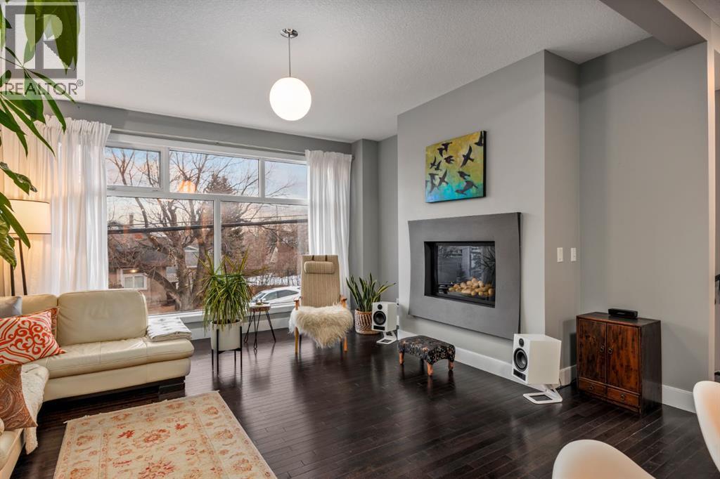 2915 17 Street Sw, Calgary, AB - Indoor Photo Showing Living Room With Fireplace