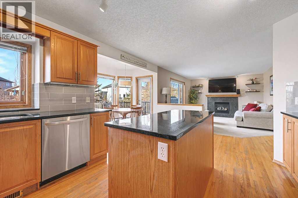 105 Citadel Crest Park Nw, Calgary, AB - Indoor Photo Showing Kitchen With Fireplace