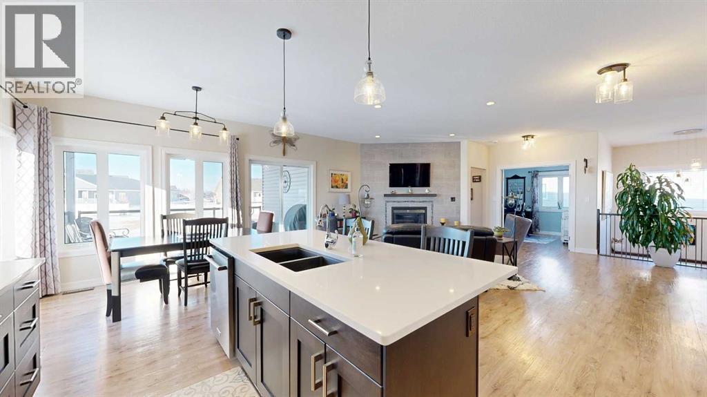 4020 Monarch Way, Stettler, AB - Indoor Photo Showing Kitchen With Double Sink With Upgraded Kitchen