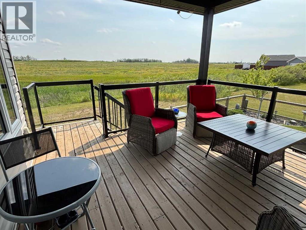 4020 Monarch Way, Stettler, AB - Outdoor With Deck Patio Veranda With Exterior