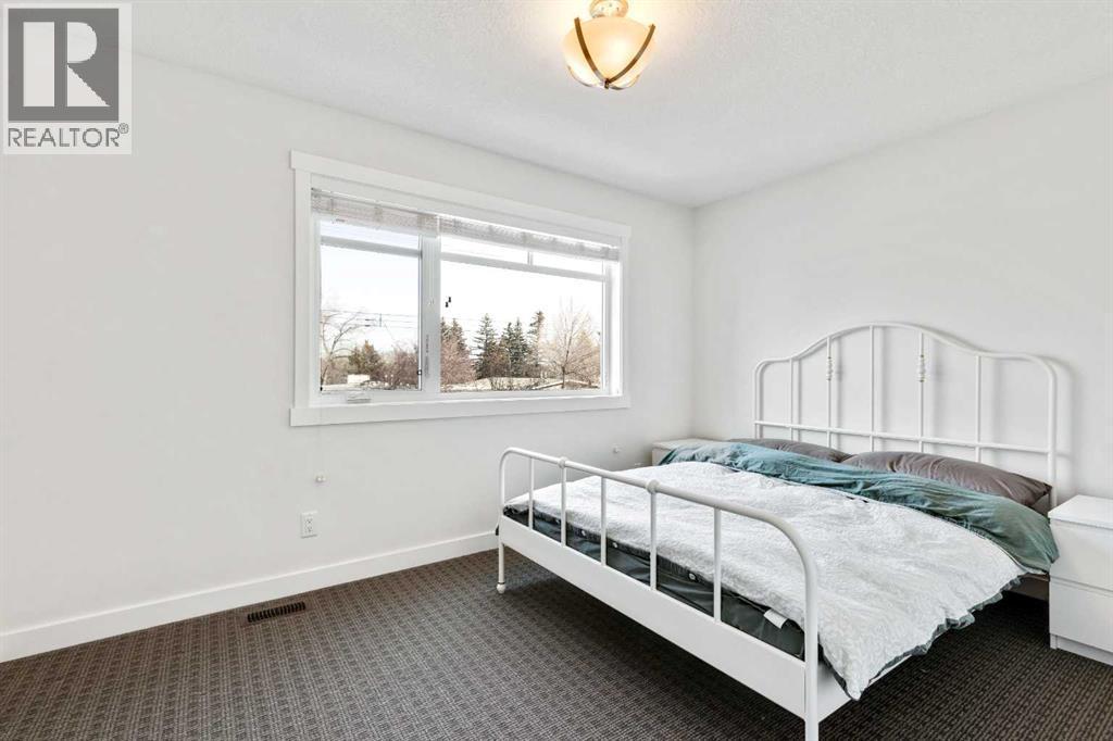 2728 Cochrane Road Nw, Calgary, AB - Indoor Photo Showing Bedroom