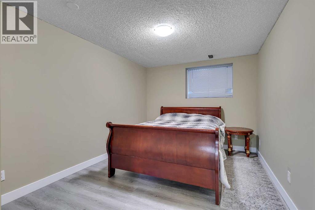 135 Panatella Close Nw, Calgary, AB - Indoor Photo Showing Bedroom