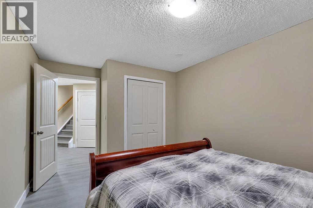 135 Panatella Close Nw, Calgary, AB - Indoor Photo Showing Bedroom