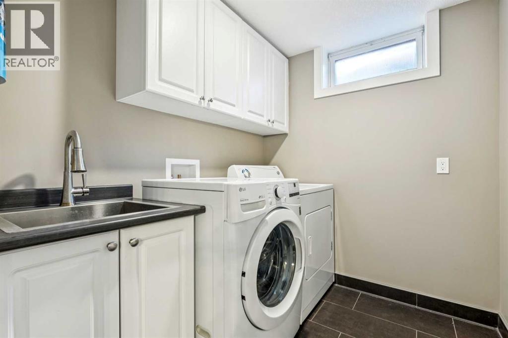 1507 Cayuga Drive Nw, Calgary, AB - Indoor Photo Showing Laundry Room