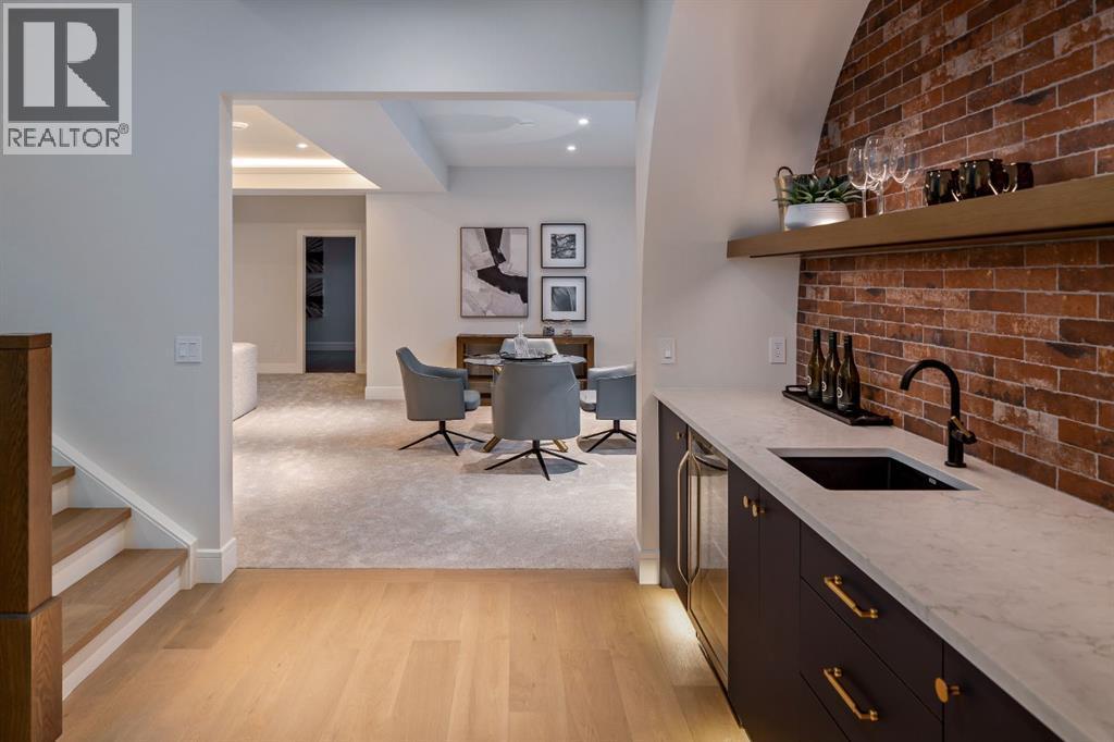 Brick Feature Wall Wet Bar with Underlit Shelving - 2920 Toronto Crescent Nw, Calgary, AB - Indoor Photo Showing Kitchen