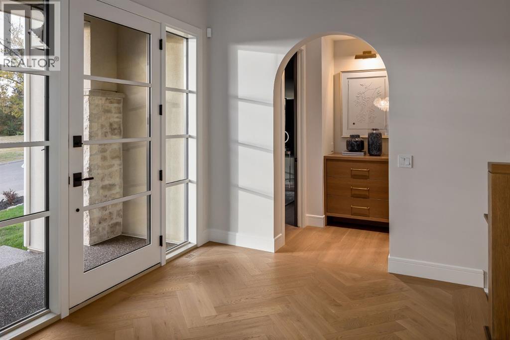 Front Entryway. Herringbone Detailing on Engineered Hardwood - 2920 Toronto Crescent Nw, Calgary, AB - Indoor Photo Showing Other Room