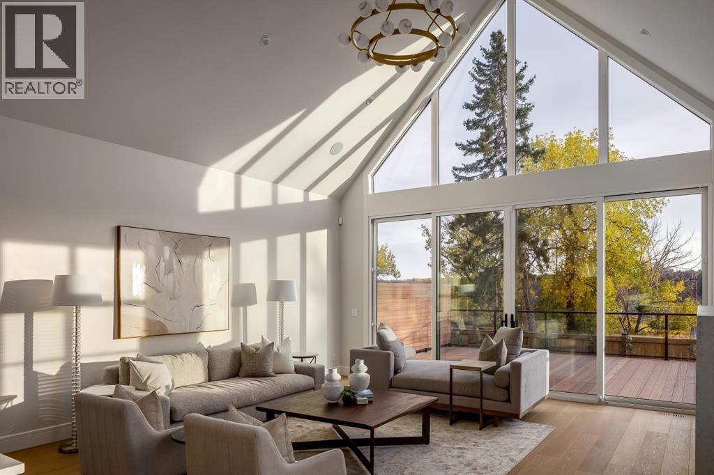Vaulted Ceiling in Great Room connecting to West-facing Deck - 2920 Toronto Crescent Nw, Calgary, AB - Indoor Photo Showing Living Room