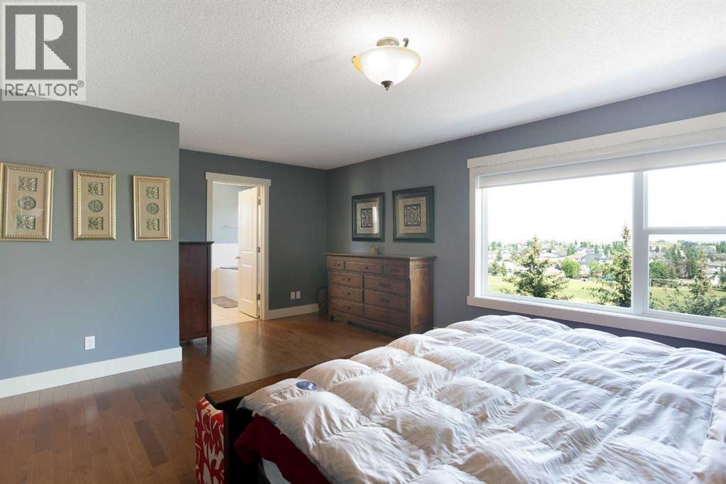 62 Panamount Road Nw, Calgary, AB - Indoor Photo Showing Bedroom