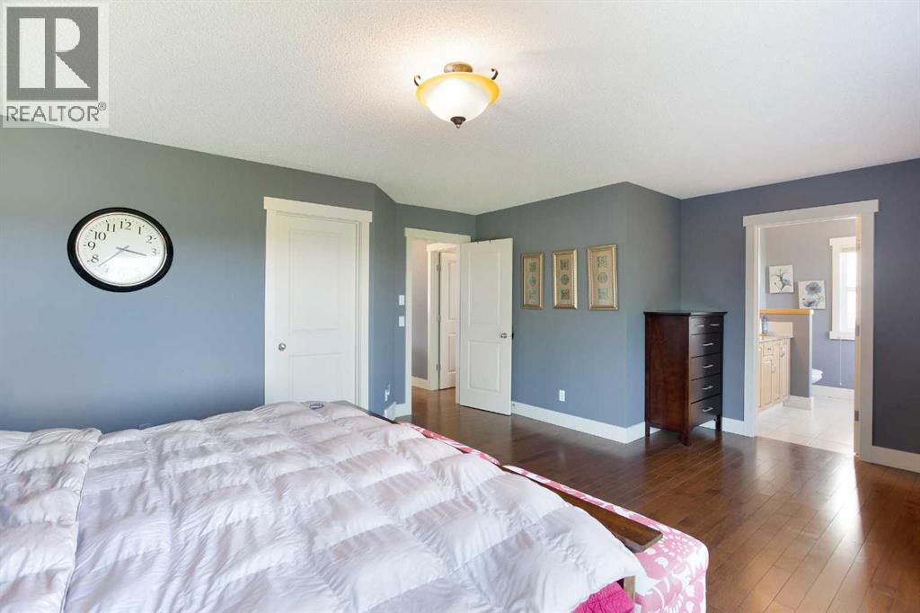 62 Panamount Road Nw, Calgary, AB - Indoor Photo Showing Bedroom