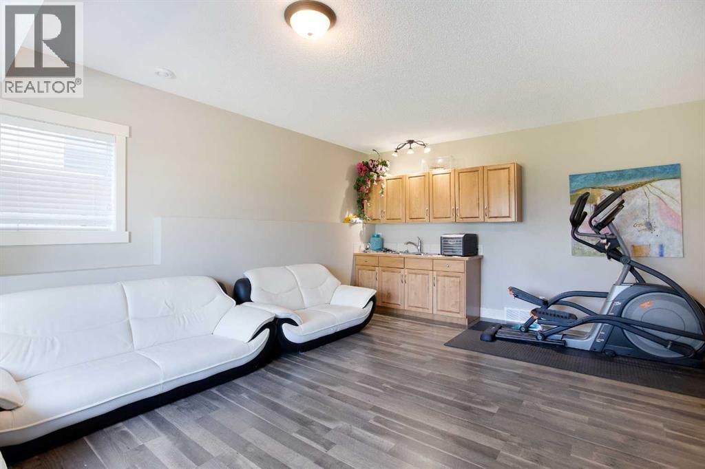 62 Panamount Road Nw, Calgary, AB - Indoor Photo Showing Gym Room