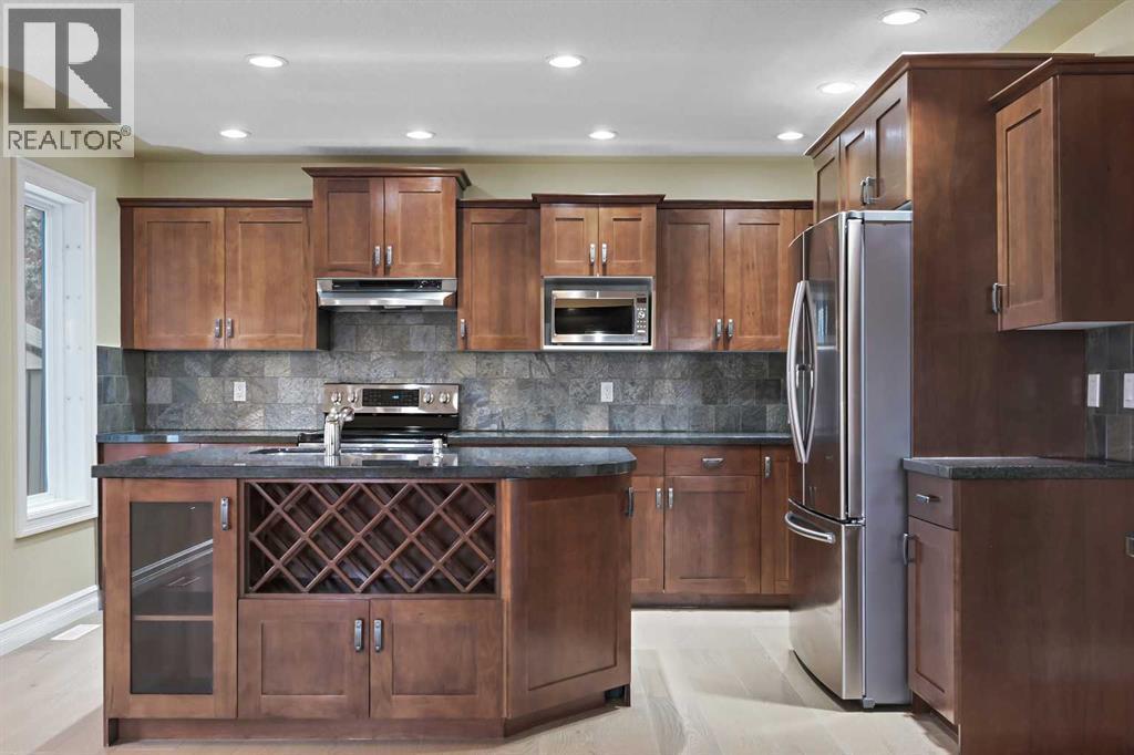 5619 Coach Hill Road Sw, Calgary, AB - Indoor Photo Showing Kitchen With Stainless Steel Kitchen