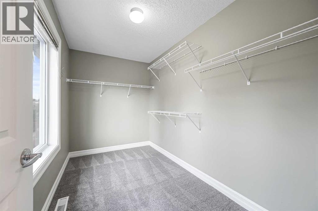 5619 Coach Hill Road Sw, Calgary, AB - Indoor With Storage