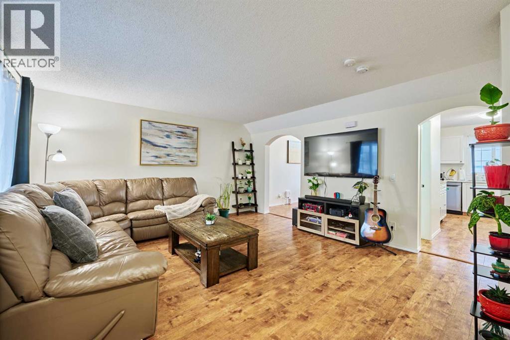 2366 Eversyde Avenue Sw, Calgary, AB - Indoor Photo Showing Living Room