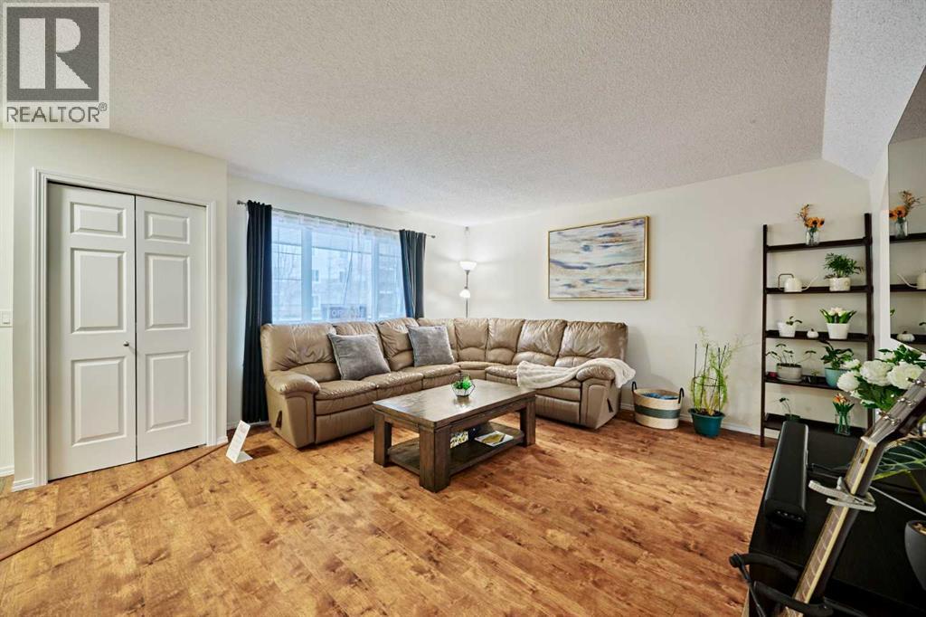 2366 Eversyde Avenue Sw, Calgary, AB - Indoor Photo Showing Living Room