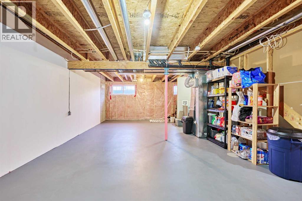 2366 Eversyde Avenue Sw, Calgary, AB - Indoor Photo Showing Basement