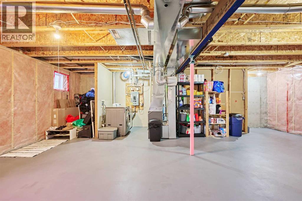 2366 Eversyde Avenue Sw, Calgary, AB - Indoor Photo Showing Basement