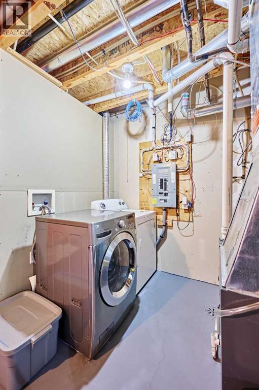2366 Eversyde Avenue Sw, Calgary, AB - Indoor Photo Showing Laundry Room