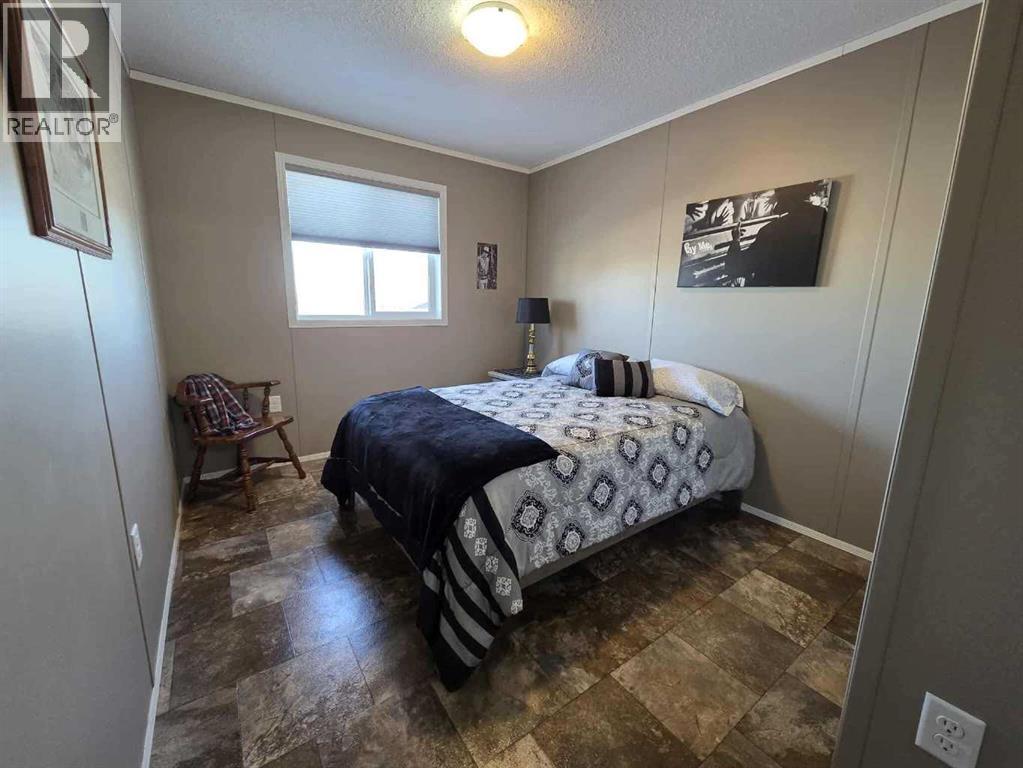 4916 49 Street, Botha, AB - Indoor Photo Showing Bedroom