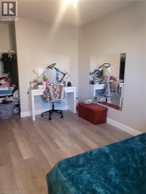 Bedroom featuring wood finished floors and baseboards - 18 Rosewell Street, Hamilton, ON - Indoor