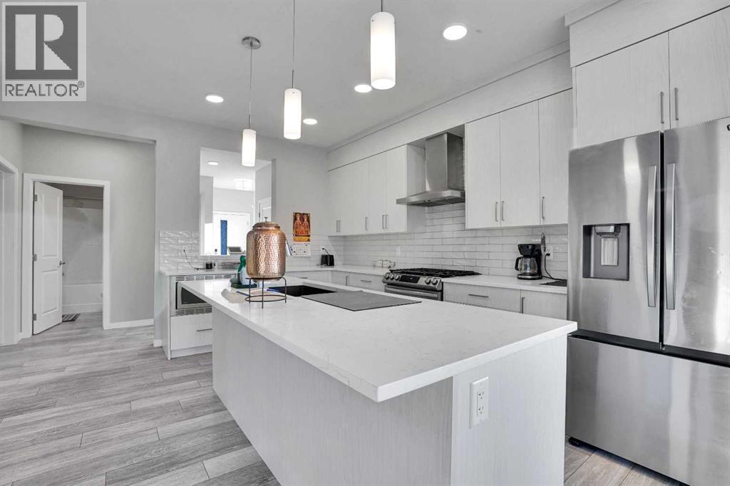 210 Lucas Close Nw, Calgary, AB - Indoor Photo Showing Kitchen With Stainless Steel Kitchen With Upgraded Kitchen