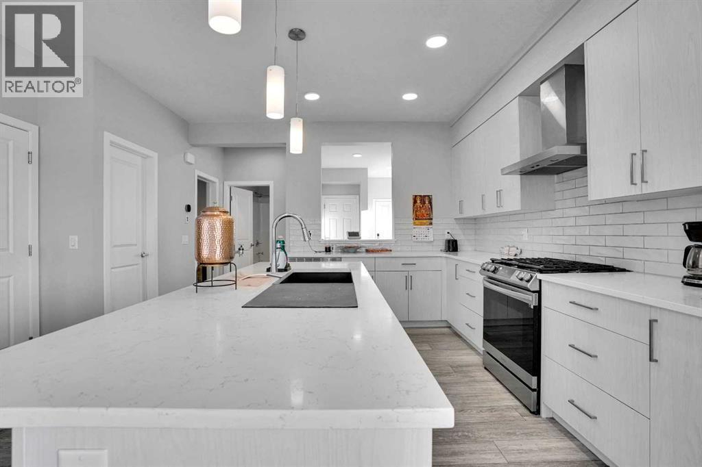210 Lucas Close Nw, Calgary, AB - Indoor Photo Showing Kitchen With Upgraded Kitchen