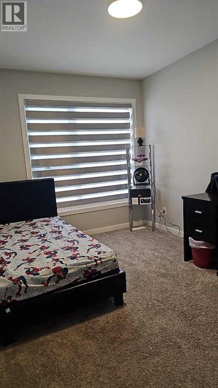 210 Lucas Close Nw, Calgary, AB - Indoor Photo Showing Bedroom