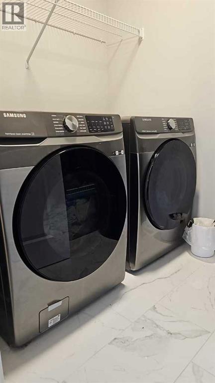 210 Lucas Close Nw, Calgary, AB - Indoor Photo Showing Laundry Room
