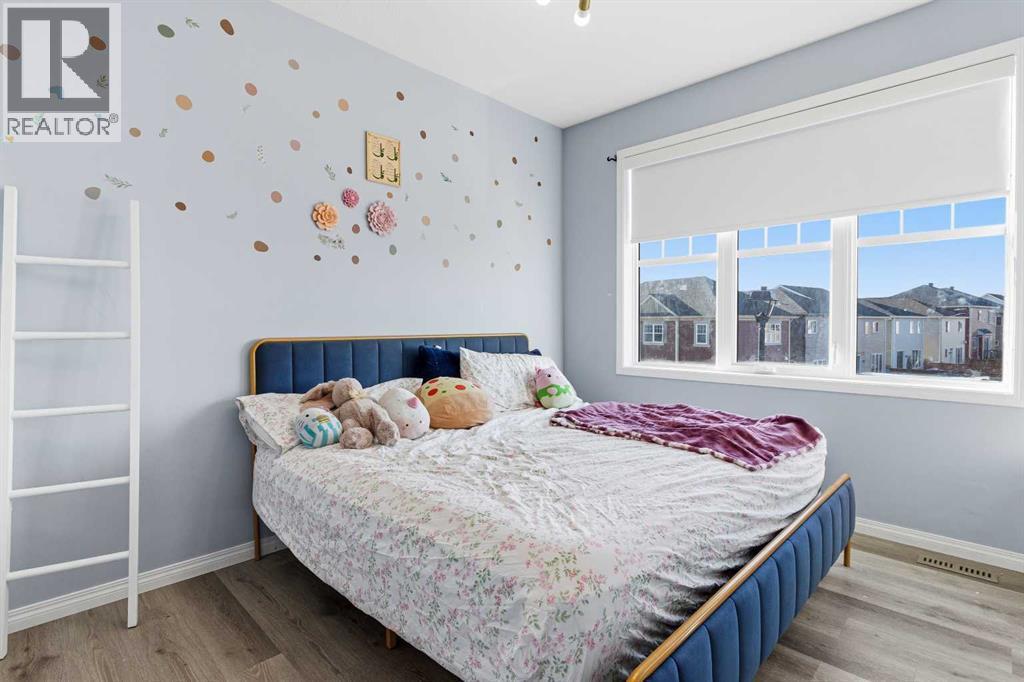 237 Windrow Crescent Sw, Airdrie, AB - Indoor Photo Showing Bedroom