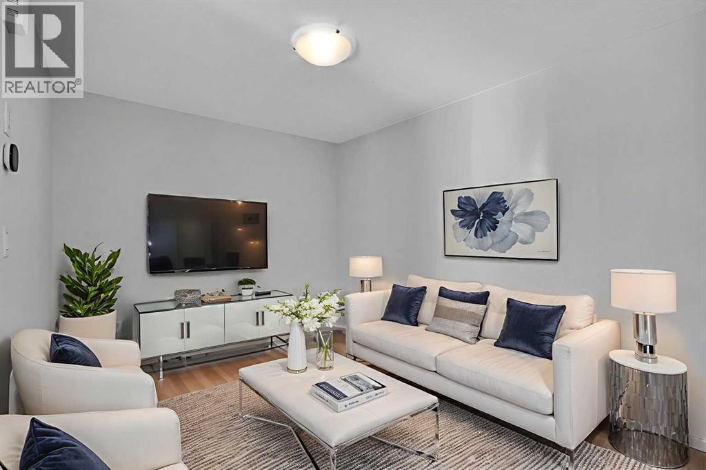 Virtually Staged Living Room - 408 Windbury Link Sw, Airdrie, AB - Indoor Photo Showing Living Room