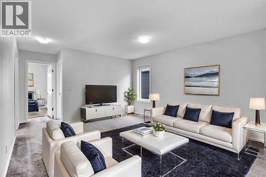 Virtually Staged Bonus room - 408 Windbury Link Sw, Airdrie, AB - Indoor Photo Showing Living Room