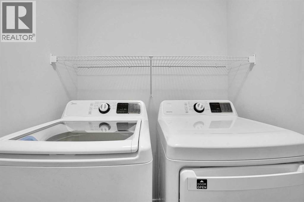 Laundry Room - 408 Windbury Link Sw, Airdrie, AB - Indoor Photo Showing Laundry Room