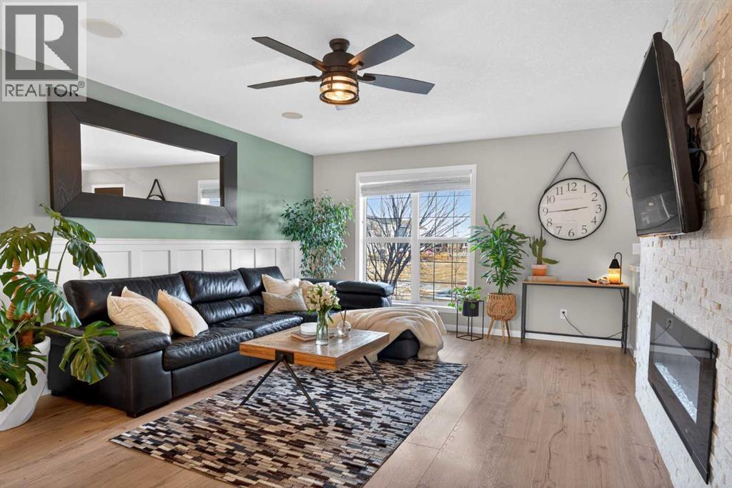 317 Legacy Boulevard Se, Calgary, AB - Indoor Photo Showing Living Room With Fireplace