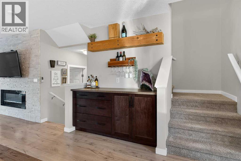 317 Legacy Boulevard Se, Calgary, AB - Indoor With Fireplace