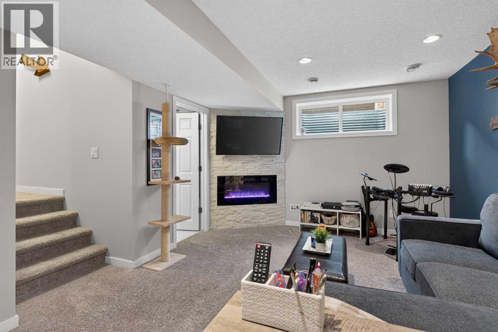 317 Legacy Boulevard Se, Calgary, AB - Indoor With Fireplace