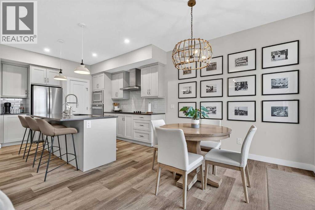 Beautiful eat in kitchen dining area - 307 Precedence Hill, Cochrane, AB - Indoor Photo Showing Other Room