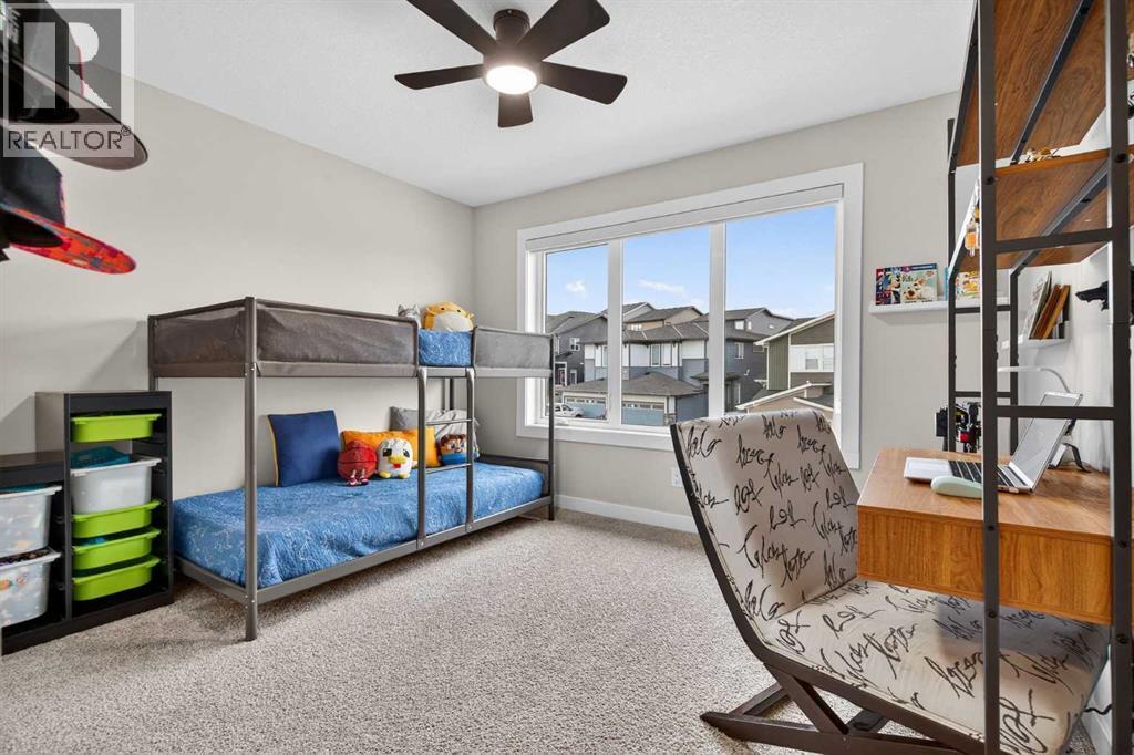 Front bedroom with large window - 307 Precedence Hill, Cochrane, AB - Indoor