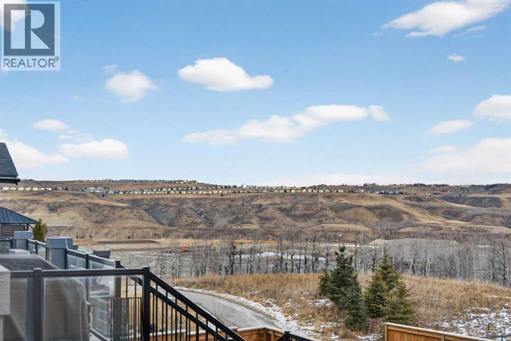 East facing backyard with stunning views of the rolling Gleneagles hills - 307 Precedence Hill, Cochrane, AB - Outdoor With View