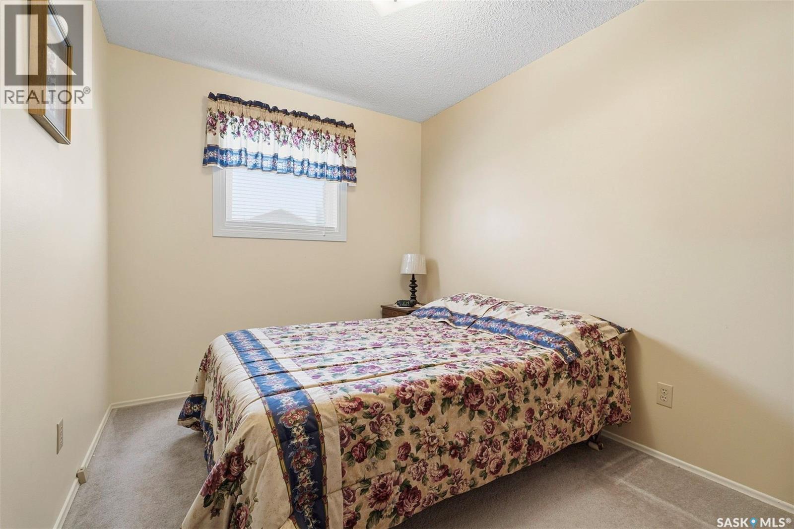 1007 Kingsmere Boulevard, Saskatoon, SK - Indoor Photo Showing Bedroom