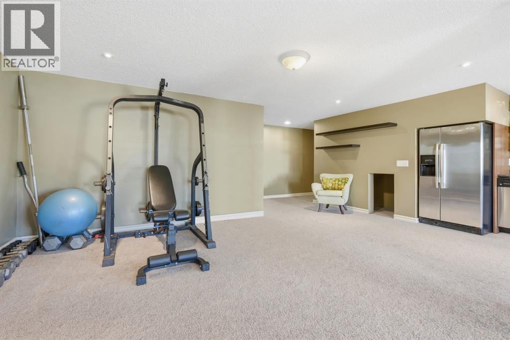 166 Cranridge Terrace Se, Calgary, AB - Indoor Photo Showing Gym Room
