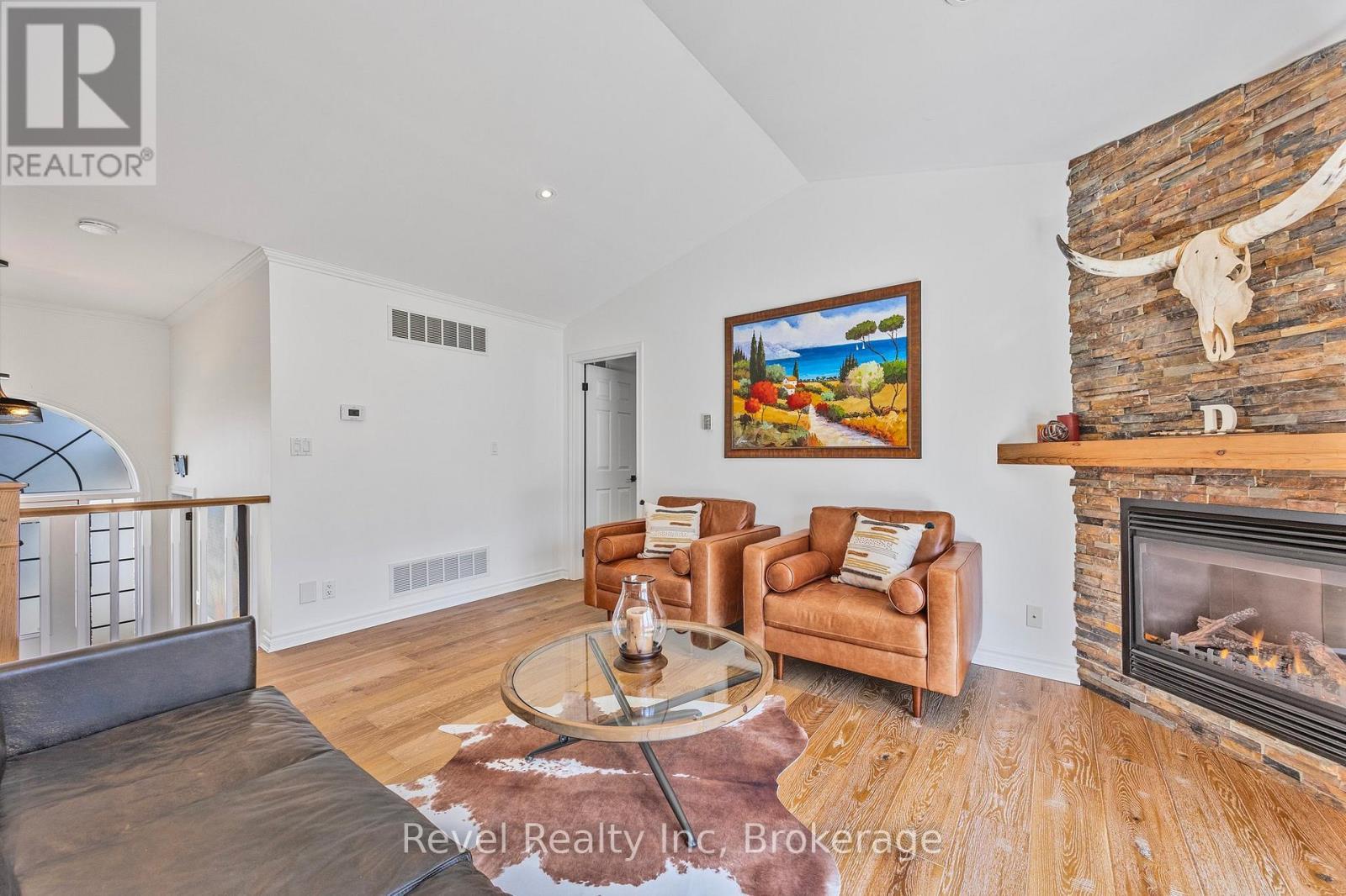 89 Trout Lane, Tiny, ON - Indoor Photo Showing Living Room With Fireplace