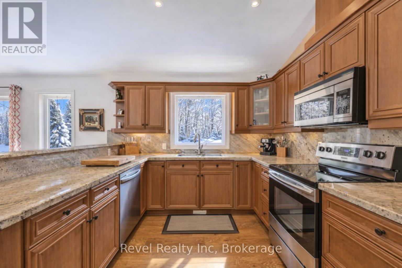 89 Trout Lane, Tiny, ON - Indoor Photo Showing Kitchen With Double Sink